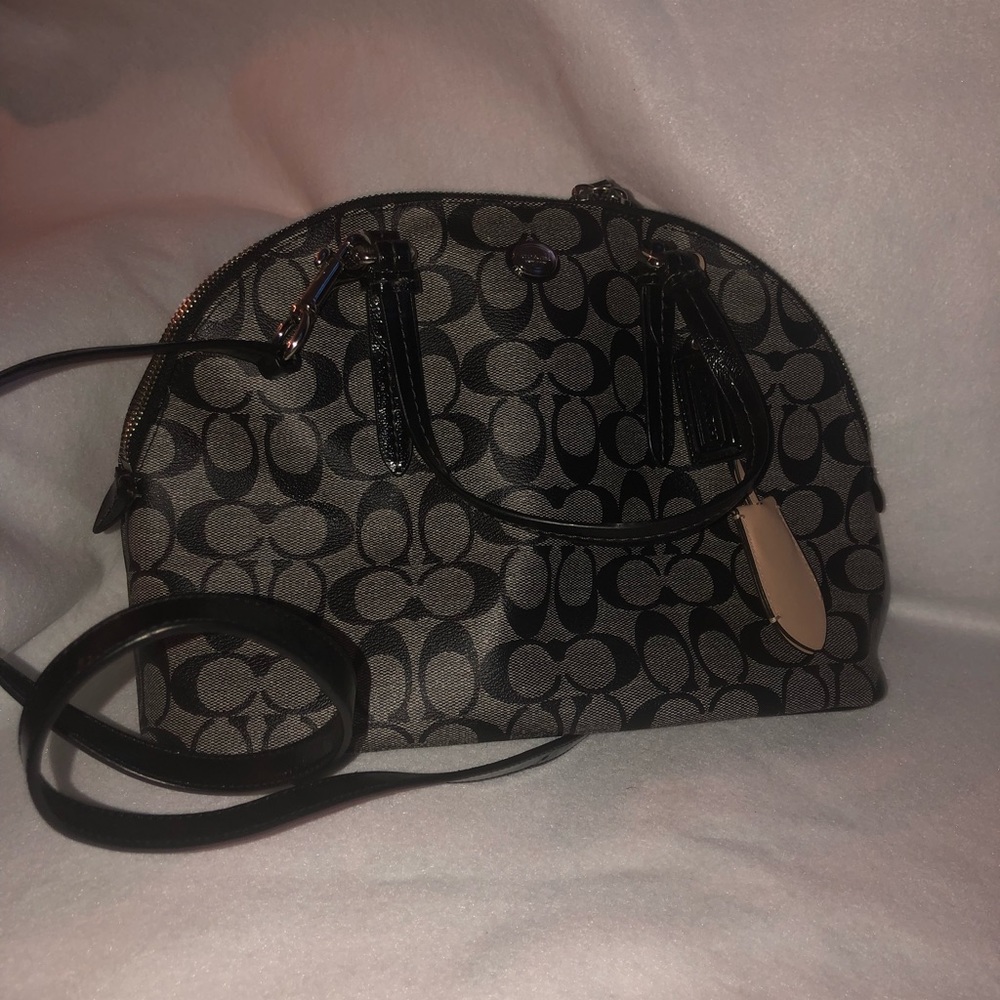 Black and grey Coach handbag